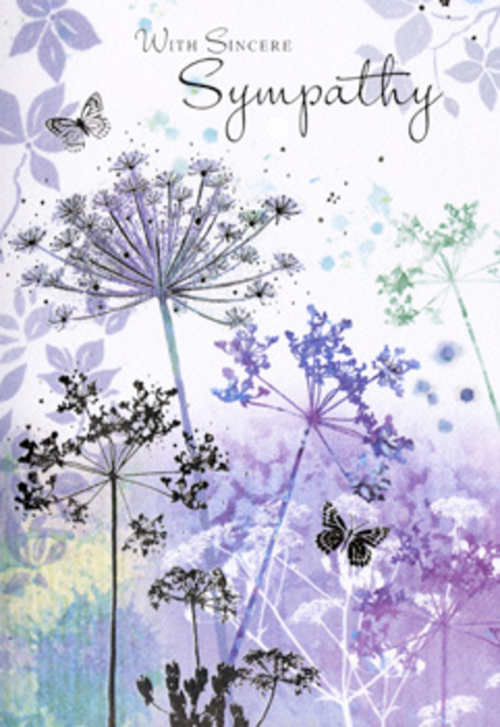 There is a tranquil, contemplative beauty to this sympathy card's design, echoing the stillness you might feel pausing beneath the trees near Chislehurst Common. Tall, spindly wildflowers rise gracefully from the lower edge, their umbelliferous tops spreading out like fine lacework against a softly painted sky. Each bloom is detailed with slender lines and intricate filigree forms, subtly shaded in violet, dusty lilac and powder blue, as though sketched by hand and then gently washed with watercolours. The background has a softly blurred quality, with diffused bands of lavender, silvery green and grey-blue, reminiscent of morning mist drifting across quiet fields. Two butterflies hover above the wispy petals, their pale wings tipped with muted colour, suggesting hope, continuity and the unseen presence of loved ones who have passed. Light in the image is gentle and dispersed, with no stark contrast, enveloping the flowers and butterflies in an atmosphere of gentleness and reflection. The whole composition feels like an invitation to pause-a visual deep breath. As a local florist serving Chislehurst families through moments of farewell, I recognise the same thoughtful restraint we aim for in our sympathy arrangements: nothing overpowering, just a steady, compassionate presence. Paired with a simple, sincere message printed within the card, this artwork becomes more than decoration; it becomes a quiet companion to grief. It would sit beautifully beside a condolence bouquet delivered to a home near the High Street or a chapel service, offering a lasting token of support that can be kept and revisited in the quieter days that follow.